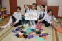 Die FALKE GRUPPE ermöglicht Kindern in Russland warme Füße